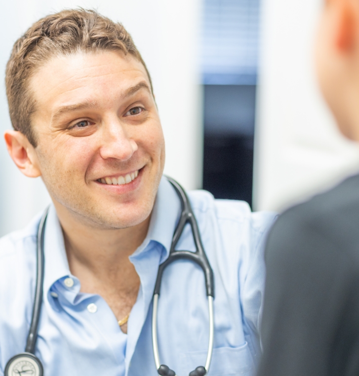 Concierge pediatrician in Orlando smiling at a patient